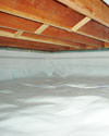 a moisture barrier installed on the walls and floors of a crawl space in Dayton