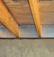 SilverGlo™ insulation installed in a floor joist in Independence, KY
