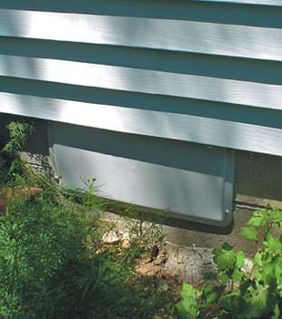 A gray crawl space vent cover in Burlington, KY
