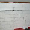 A buckling foundation wall in a Piqua home.