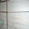 Severe foundation damage from a long crack in a bucking wall of a Fairborn home.