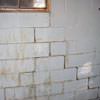 A cracked foundation wall near a window in a Lebanon home