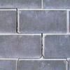 A diagonal stair-step crack found along a foundation wall in a Sidney home