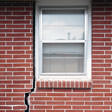 foundation cracks along a window in Stone Mountain