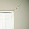 A long drywall crack beginning at the corner of a doorway in a Latonia, KY home.