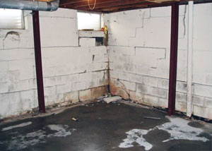 A failed, rusty i-beam foundation wall system installed in Vandalia.