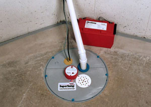 A sump pump system with a battery backup system installed in Piqua