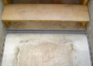 Our grated drain system installed on a leaking basement staircase in Vandalia.
