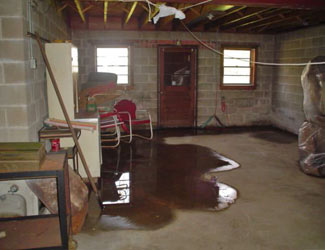 a flooded basement floor in a Springboro home