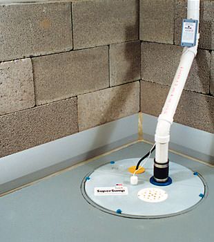 A baseboard basement drain pipe system installed in Florence, KY
