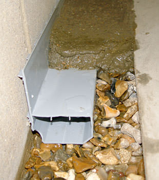 A basement drain system installed in a Covington, KY home