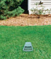 A buried gutter drain downspout extension installed in a Springboro home
